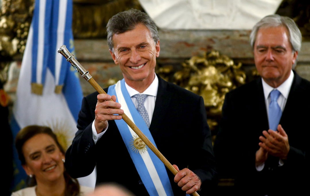 Argentina’s President Mauricio Macri holds the symbolic leader’s staff after being sworn-in as president at Casa Rosada Presidential Palace in Buenos Aires